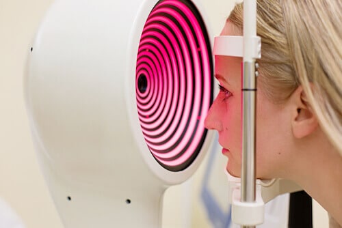 Woman getting eye exam