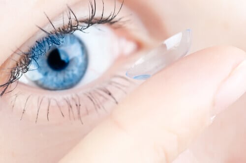 Close up of putting in contact lens