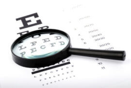 Magnifying glass on eye chart